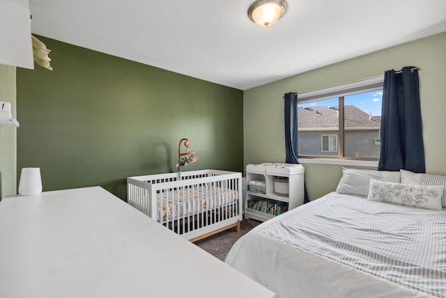 bedroom featuring carpet