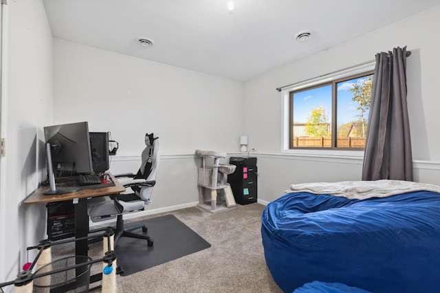 bedroom with visible vents, carpet floors, and baseboards