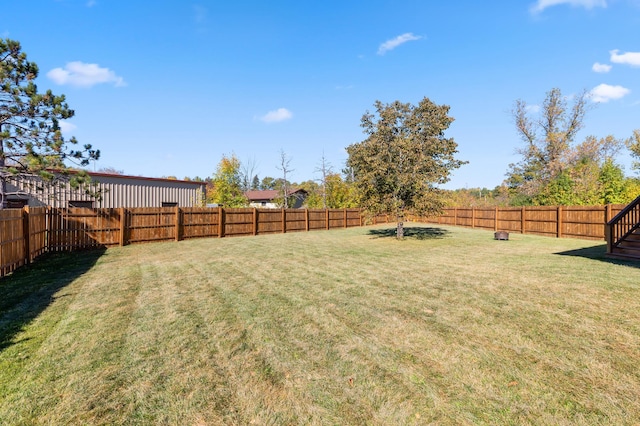 view of yard featuring a fenced backyard