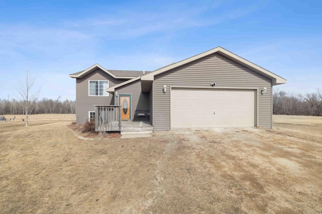 view of front facade featuring an attached garage and driveway