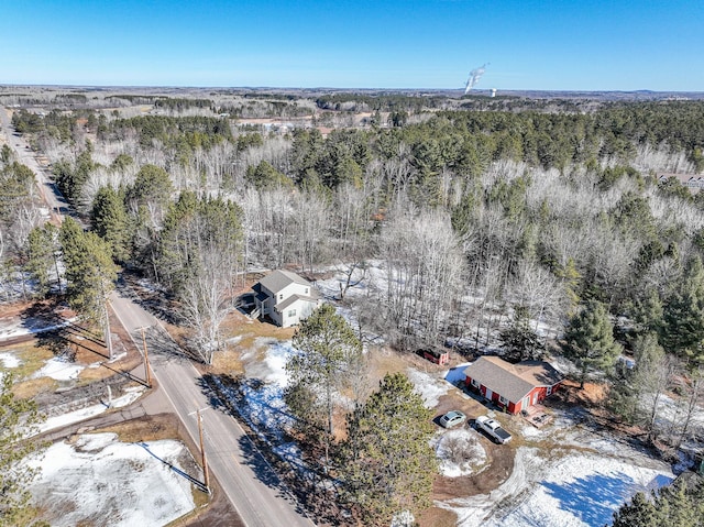 bird's eye view featuring a forest view