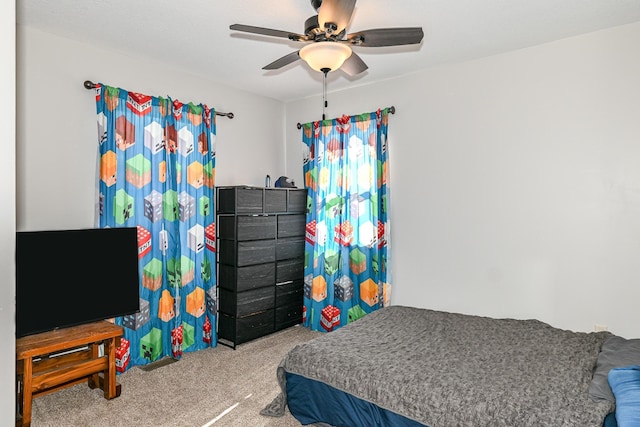 bedroom with carpet flooring and a ceiling fan