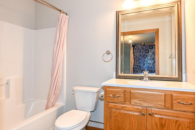 full bath featuring shower / tub combo, toilet, and vanity