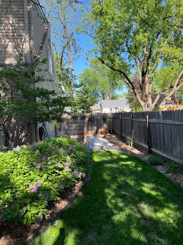 view of yard featuring a fenced backyard