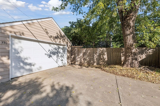 detached garage with fence