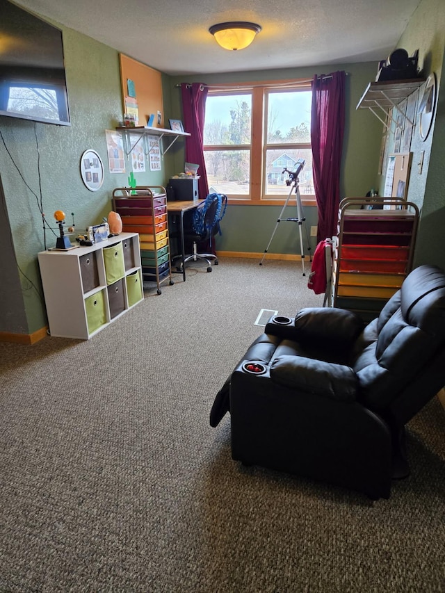 carpeted office space featuring baseboards, a textured ceiling, and a textured wall