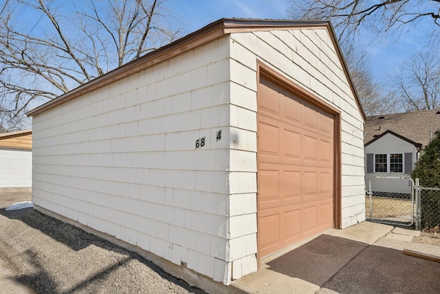 garage with fence