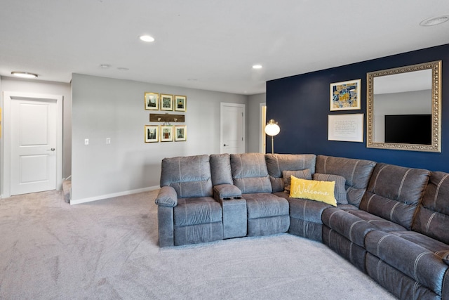 living room with recessed lighting, baseboards, and carpet floors