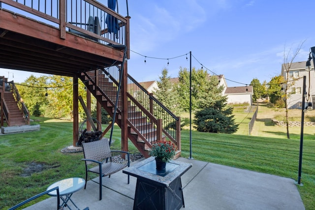 view of patio / terrace with a deck and stairway