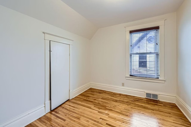 4250 32nd Ave S, Minneapolis, MN 55406 - bonus room featuring baseboards, visible vents, light wood-style flooring, and vaulted ceiling