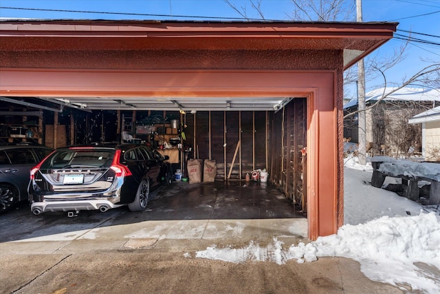 view of snow covered garage