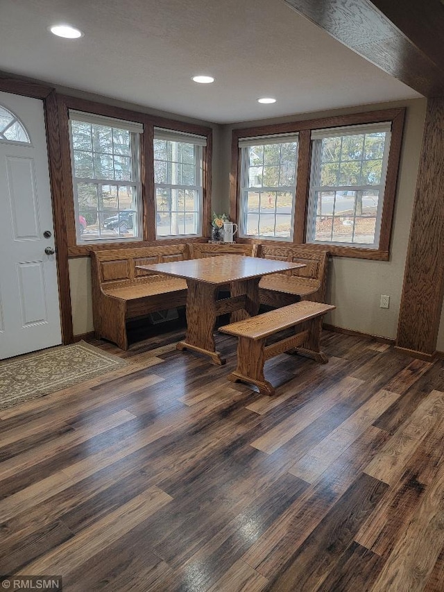 dining space featuring recessed lighting and dark wood finished floors