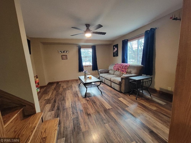 living room featuring wood finished floors and ceiling fan