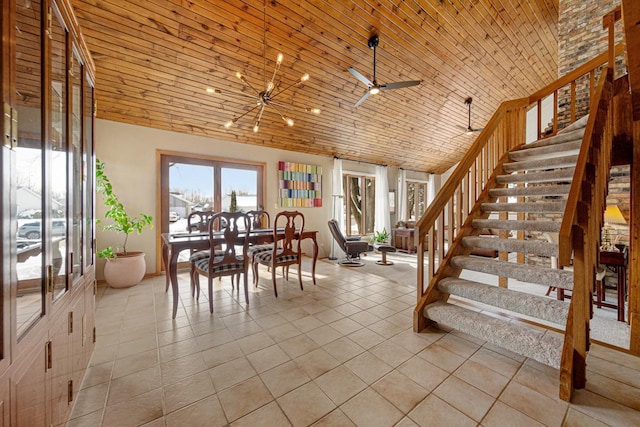 dining room with light tile patterned floors and wooden ceiling