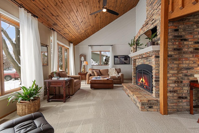 living room with light carpet, high vaulted ceiling, a brick fireplace, and wooden ceiling