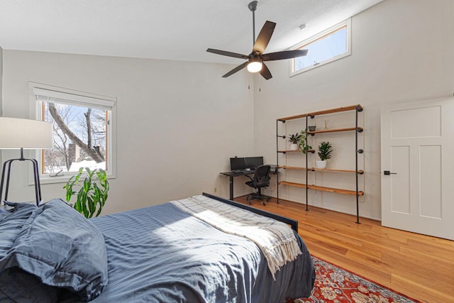 bedroom featuring ceiling fan and wood finished floors