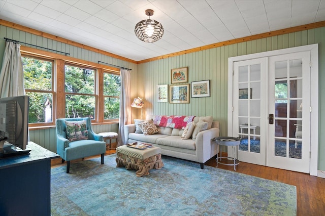 living room with french doors and wood finished floors