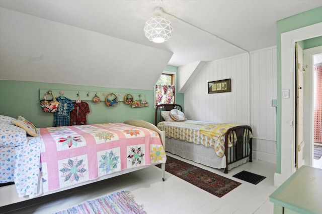 bedroom featuring vaulted ceiling