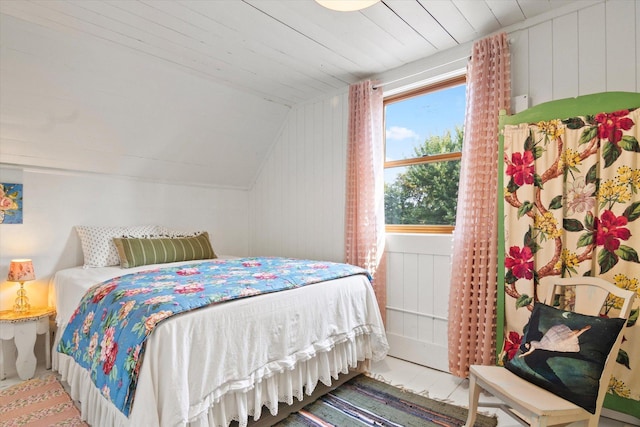 bedroom featuring lofted ceiling and wooden ceiling