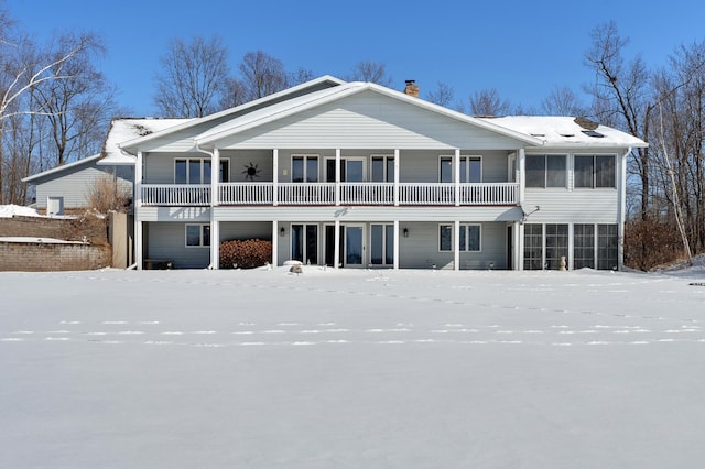 view of snow covered house