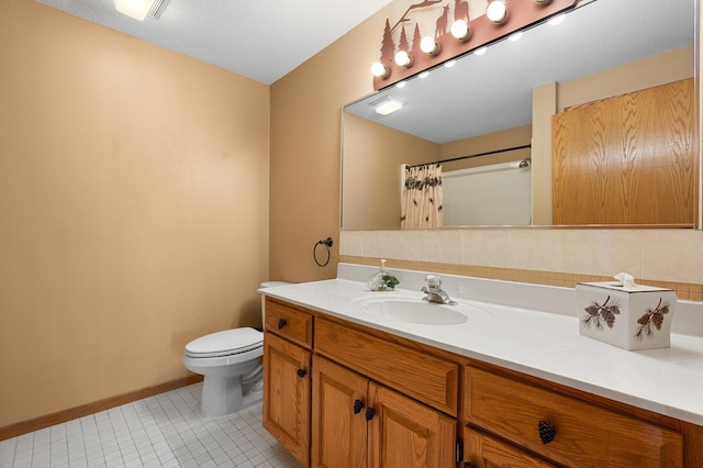 bathroom featuring vanity, baseboards, tile patterned flooring, curtained shower, and toilet