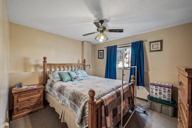 carpeted bedroom with a textured ceiling and ceiling fan