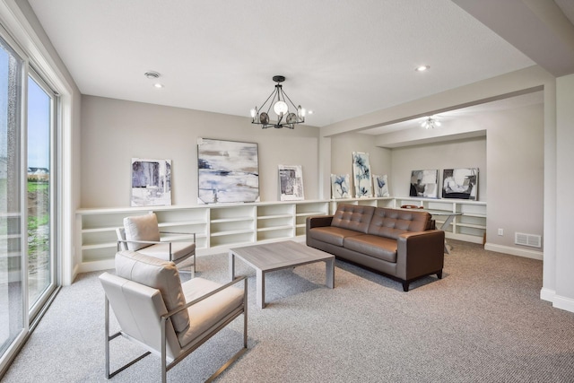 living room featuring visible vents, recessed lighting, an inviting chandelier, carpet flooring, and baseboards