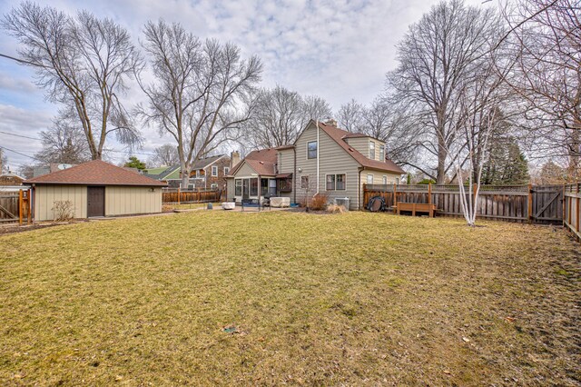 5920 Colfax Ave S, Minneapolis, MN 55419 - exterior space featuring a lawn, a fenced backyard, and a chimney