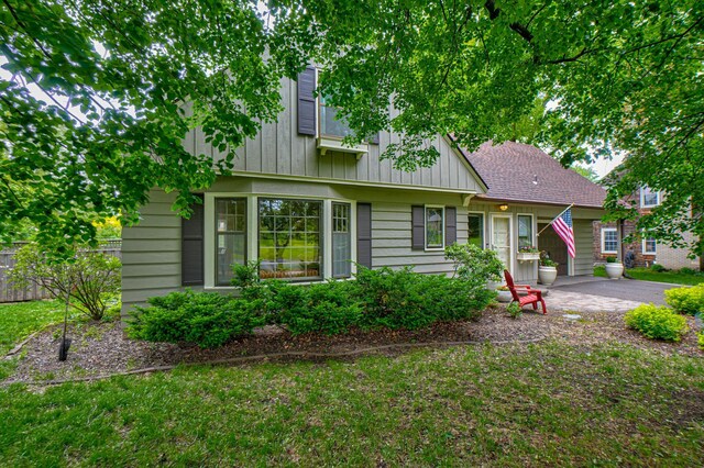 5920 Colfax Ave S, Minneapolis, MN 55419 - view of front of house with board and batten siding and roof with shingles
