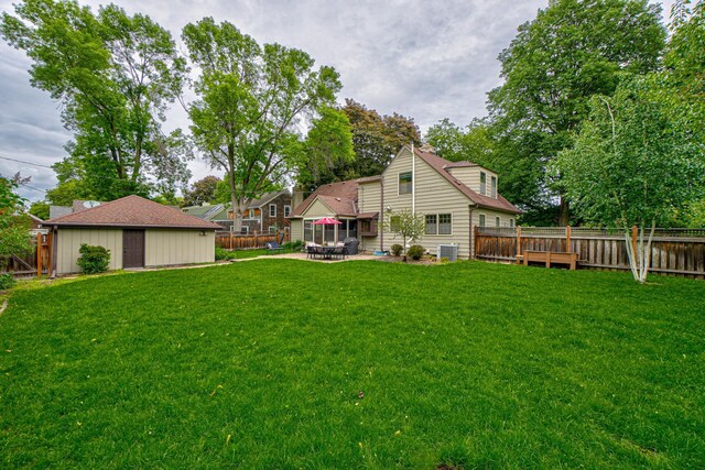 5920 Colfax Ave S, Minneapolis, MN 55419 - view of yard featuring central air condition unit and a patio