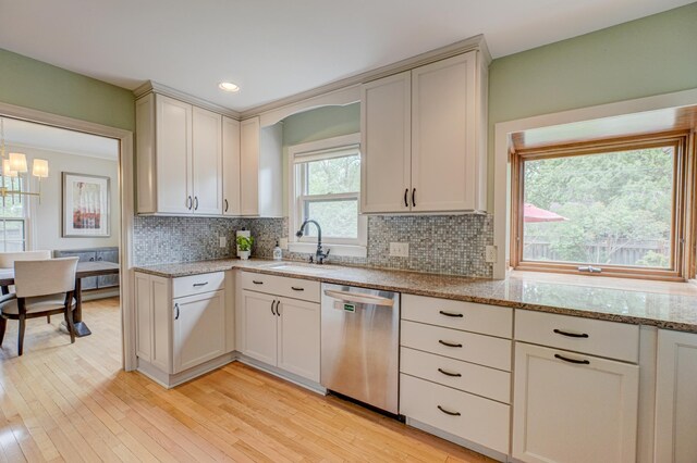 5920 Colfax Ave S, Minneapolis, MN 55419 - kitchen featuring dishwasher, a sink, light wood finished floors, backsplash, and recessed lighting