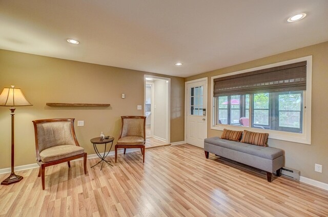 5920 Colfax Ave S, Minneapolis, MN 55419 - living area with baseboard heating, light wood finished floors, baseboards, and recessed lighting
