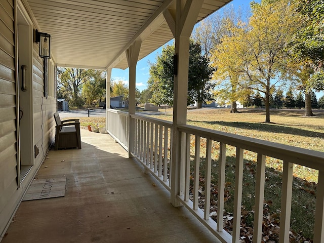 balcony featuring a porch