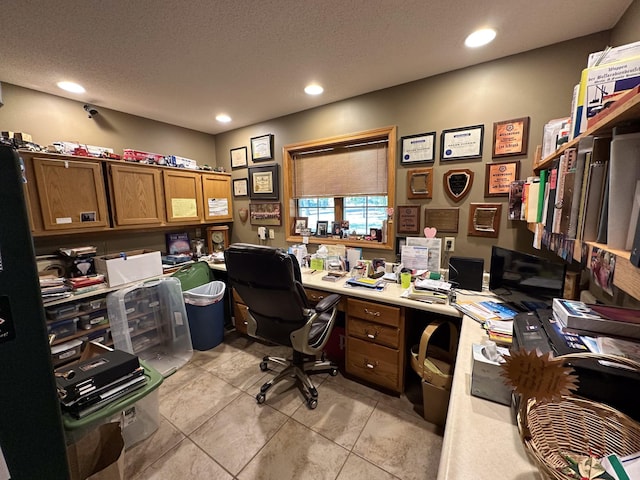 home office with light tile patterned flooring, recessed lighting, and a textured ceiling