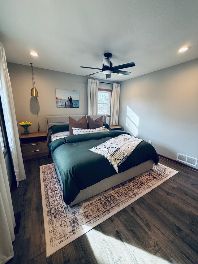 bedroom featuring recessed lighting, visible vents, a ceiling fan, and dark wood-style flooring