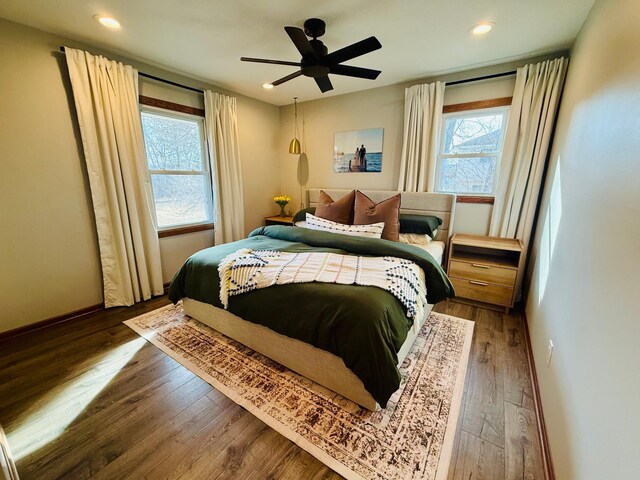 bedroom featuring recessed lighting, baseboards, ceiling fan, and wood finished floors