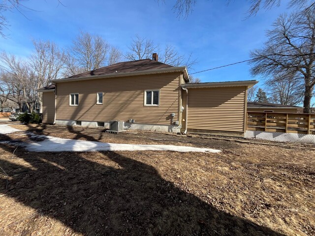 361 Hollett St, Tracy, MN 56175 - back of house featuring a deck and a chimney