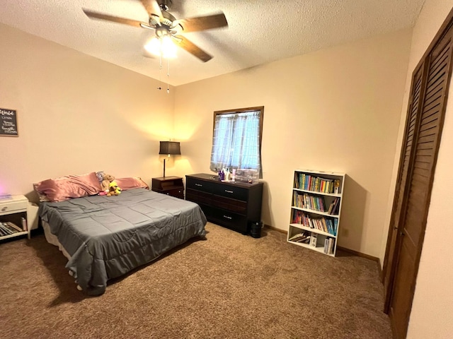 361 Hollett St, Tracy, MN 56175 - bedroom with carpet, a textured ceiling, a closet, and a ceiling fan