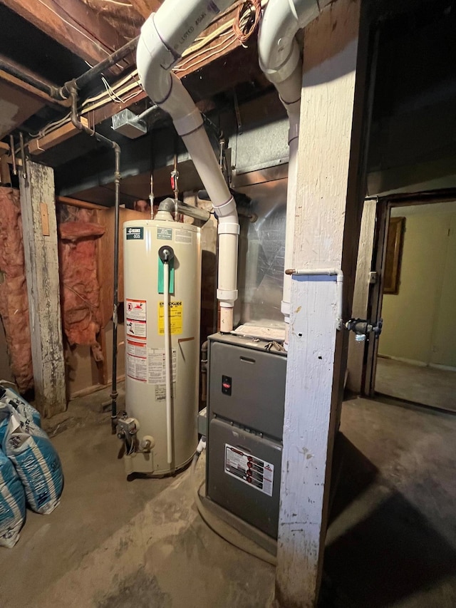 361 Hollett St, Tracy, MN 56175 - utility room featuring gas water heater