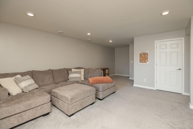 living room featuring carpet flooring, recessed lighting, and baseboards