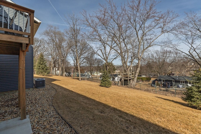 view of yard with central air condition unit