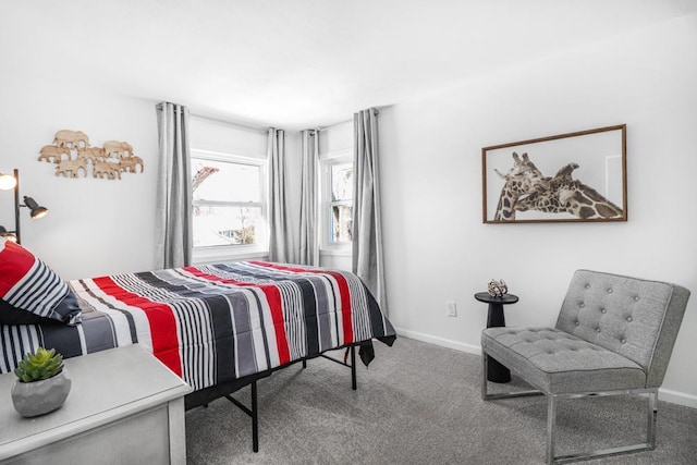 carpeted bedroom with baseboards