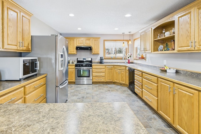 kitchen featuring white microwave, recessed lighting, stainless steel range with gas stovetop, under cabinet range hood, and dishwasher