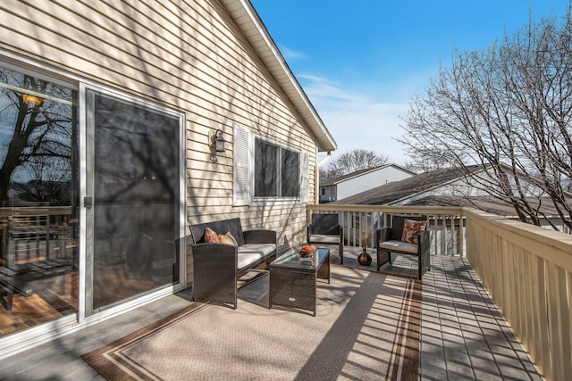 wooden terrace with outdoor lounge area