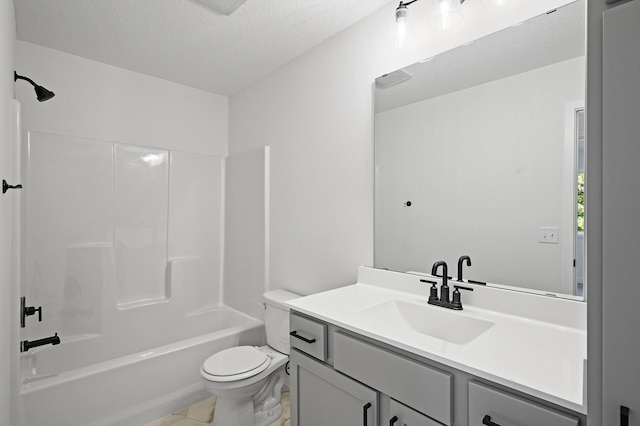 full bathroom with a textured ceiling, toilet, vanity, and bathtub / shower combination