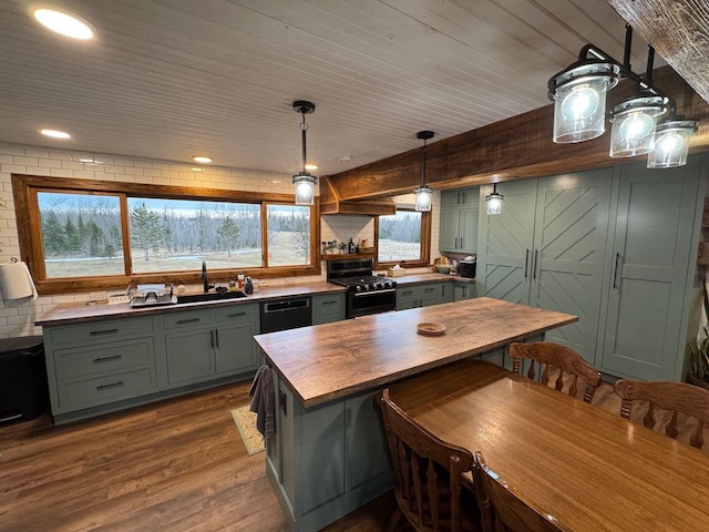 kitchen with wood counters, tasteful backsplash, range with gas cooktop, dishwasher, and dark wood-style flooring