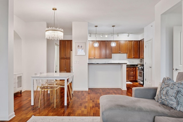 500 Grant St Unit 807, Minneapolis, MN 55404 - interior space with baseboards, a notable chandelier, and dark wood-style floors