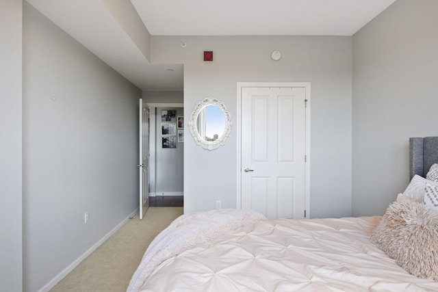 500 Grant St Unit 807, Minneapolis, MN 55404 - bedroom with baseboards and light carpet
