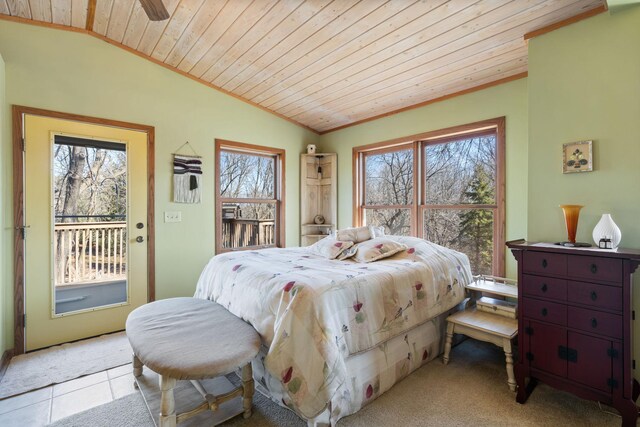 bedroom featuring wood ceiling, access to exterior, light tile patterned flooring, and vaulted ceiling