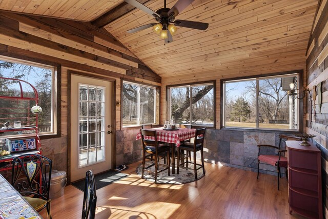 sunroom / solarium featuring wooden ceiling, vaulted ceiling with beams, and ceiling fan